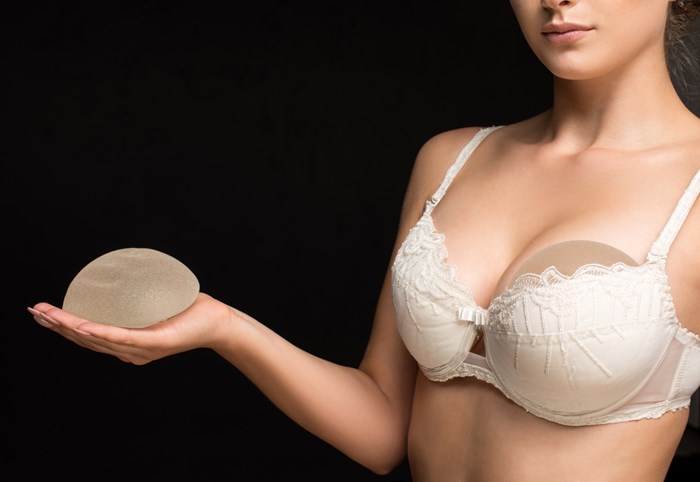 Most women with silicone breast implants need more surgery