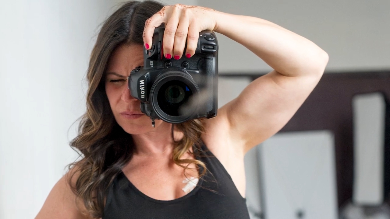Photographer turns camera on herself to normalize breast cancer